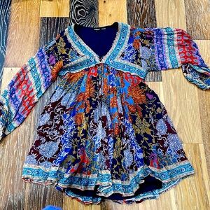 Cute baby doll style dress. XL but more like a large. Used once.